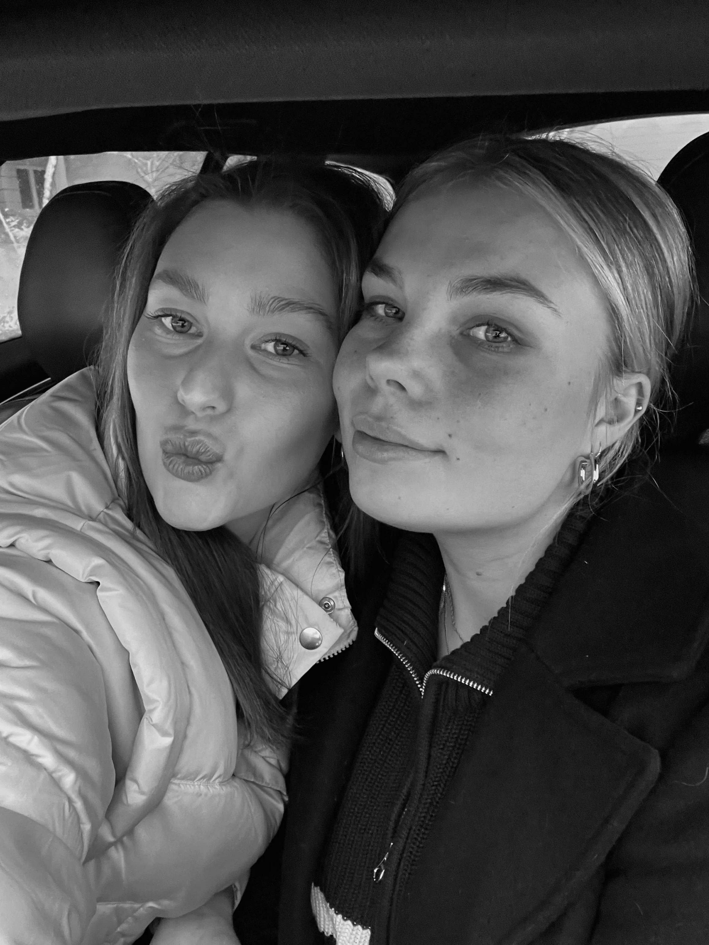 a couple of women posing for the camera